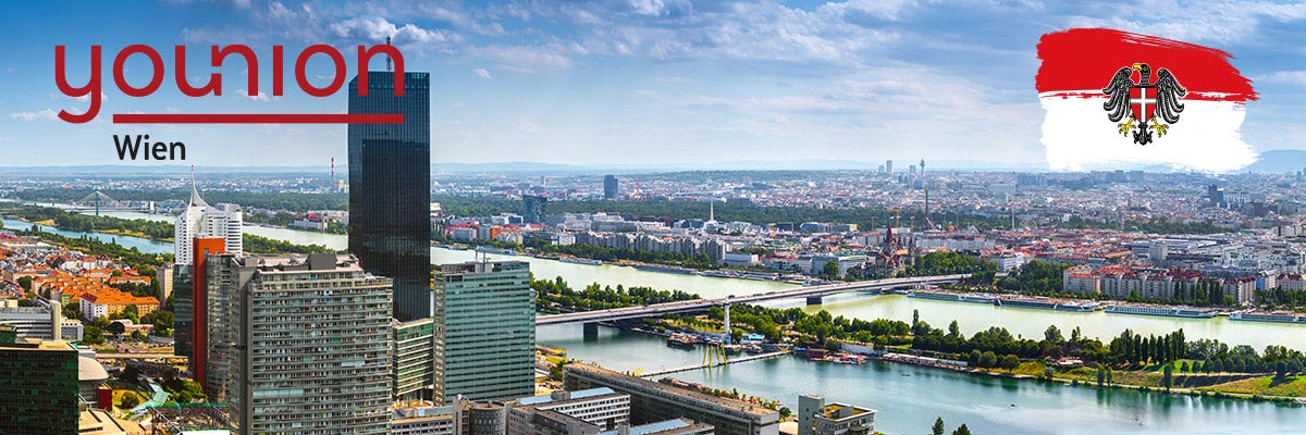 Stunning aerial panoramic cityscape view austrian capital city of Vienna.  Modern glass-concrete skyscrapers in the ancient city on the banks the Danube -of the largest river in Europe. Hot summer day