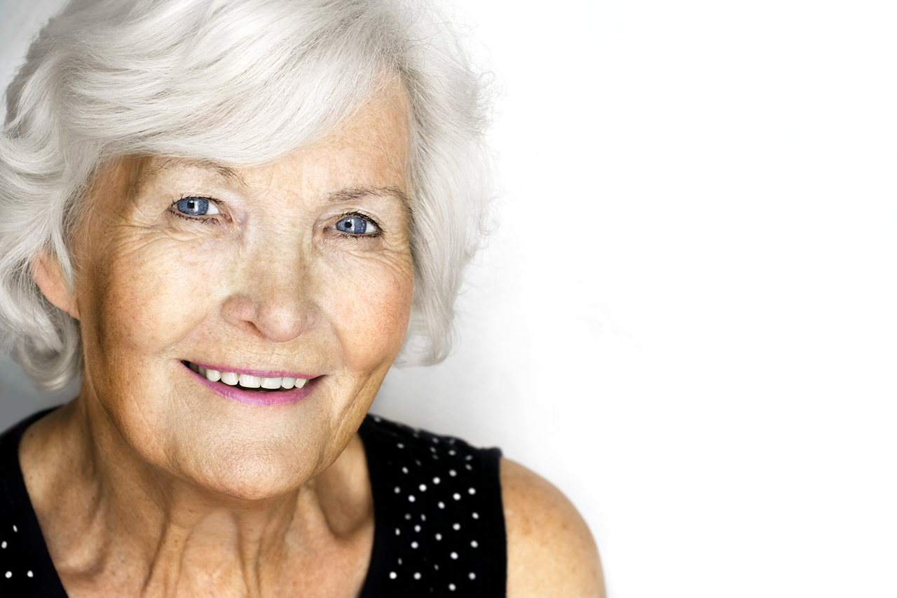 Senior woman portrait, on white background with white hair 